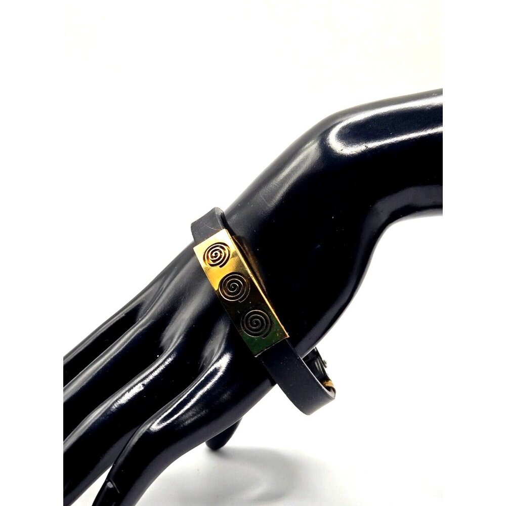 Stainless Steel and rubber bracelet.  Stainless front and buckle clasp